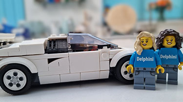 Should I buy a car through my business or personally?